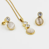 Gold/steel color sticking cat's eye stones + two small round cakes topped with diamonds jewelry set