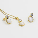 Gold/steel color sticking cat's eye stone + a small round cake with diamonds on top jewelry set