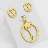 Set of cut jewelry in the shape of a key inside a circle in gold/steel + diamonds