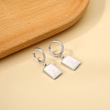 Boucles d'oreilles clous cercle 2x12,7 mm avec coquillage blanc rectangulaire