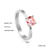 Smooth four prong band & round Pink diamond ring