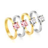 Smooth four prong band & round Pink diamond ring