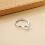 Smooth four prong band & round white diamond ring