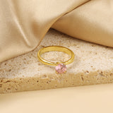 Smooth four prong band & round Pink diamond ring