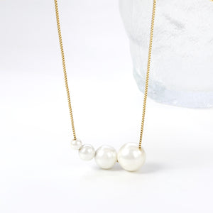 4 large and small white pearls 5+7+10+12mm necklace 45+5cm steel color