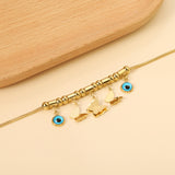 3 large and small butterflies 12*10mm+2 round blue eye pendants 8mm+10 round pass beads+5 round pass posts Bracelet 18+5cm Gold color