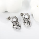 12.3*22.3mm double buckle earrings with CNC white zirconia earrings in steel color/golden