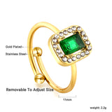 Baguette green diamond with small white diamonds ending in an open round bead ring