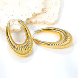 Hollow long fat U-shaped textured earrings 31*46.2mm gold color