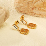 4.3*9mm rectangle with white zirconium + 10.5*11.5mm square with sunflower pattern earrings gold color