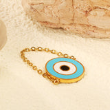 15mm Round Eye with Blue Drip Soft Ring Gold Color