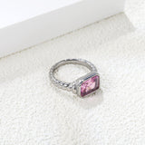 Oversized pink diamonds on a threaded band ring.