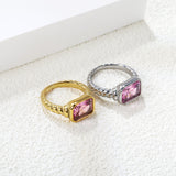 Oversized pink diamonds on a threaded band ring.