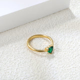 Green diamond heart shaped three claw ring