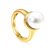 Minimalist band ring with oversized white round pearls.