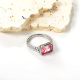 Oversized pink diamonds on a threaded band ring.