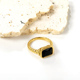 Oversized black diamonds on a threaded band ring.