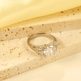 Oversized white oval diamonds on a threaded band ring.