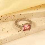 Oversized pink diamonds on a threaded band ring.