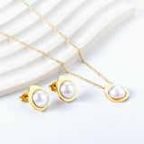 Teardrop shaped jewelry set with half white pearl steel color / gold