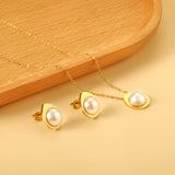 Teardrop shaped jewelry set with half white pearl steel color / gold