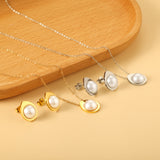 Teardrop shaped jewelry set with half white pearl steel color / gold