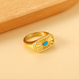 Twisted textured irregular surface set turquoise ring