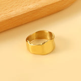 Exaggerated style ring with an oversized curved surface