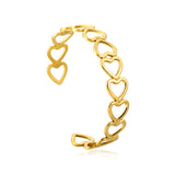 Bracelet with multiple openings in the shape of hollowed-out hearts linked together.