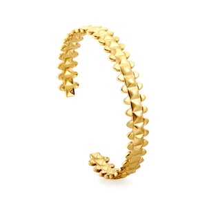 Bracelet with uneven surface in the shape of an open spine