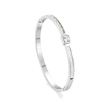 Bracelet combining two rectangular shells & diamond-set surfaces