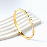 Bracelet combining two rectangular shells & diamond-set surfaces