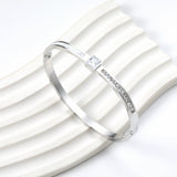 Bracelet combining two rectangular shells & diamond-set surfaces