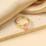 Square solitaire ring with pink diamonds