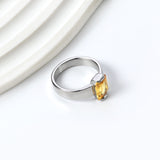 Square solitaire ring with yellow diamonds