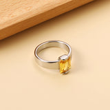 Square solitaire ring with yellow diamonds