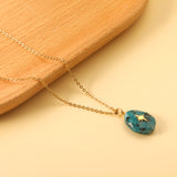 Aquamarine teardrop shaped stone with gold octopus pendant 13.4*18.8mm Necklace 40+5cm Gold color