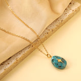 Aquamarine teardrop shaped stone with gold octopus pendant 13.4*18.8mm Necklace 40+5cm Gold color