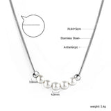 5 white pearls 4.9mm + 2 steel beads 3.9mm necklace 44+5cm