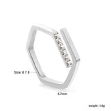 Hexagonal ring with white zirconia head, CNC set, height 5.7 mm, steel color / gold