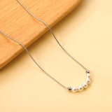 5 white pearls 4.9mm + 2 steel beads 3.9mm necklace 44+5cm