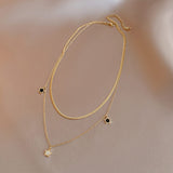 Charming Gold - toned Jewelry Set with Star and Black Gemstone Accents (Bracelet and Necklace) - Customize only