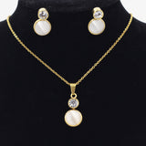 Gold/steel color sticking cat's eye stone + a small round cake with diamonds on top jewelry set