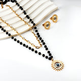 Blue eyes + black bead chain set steel/golden