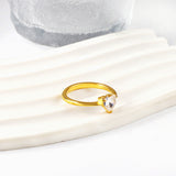 White diamond heart shaped three claw ring