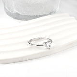 White diamond heart shaped three claw ring