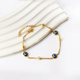 3 Blue Cat's Eye + 4 Steel Beads Soft Bracelet 19+3cm Golden