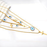 4 blue eyeballs + 4 crosses + large eyeball pendant triple chain 55+43+40+5cm