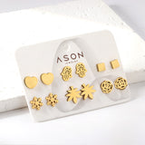 Six pairs of Mixed Card Cut Heart / Snowflake Stud Earrings gold color