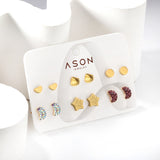 Six pairs of mixed mounted cut-out clay moon / shell stud earrings gold color